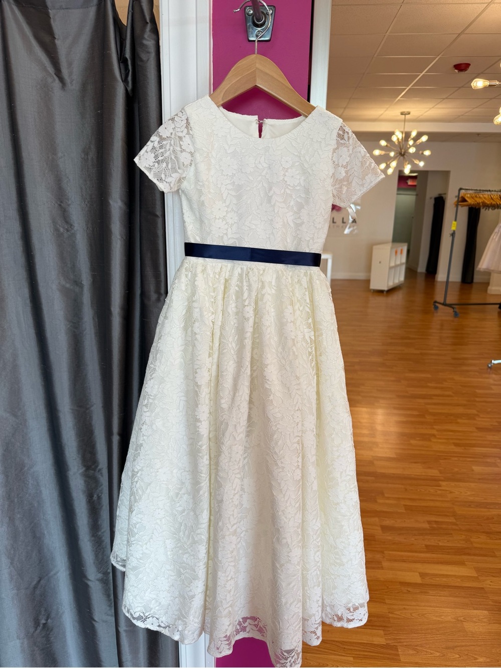 Rosebud Ivory Lace Girls' Dress with Navy Ribbon
